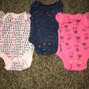 3 adorable onesies